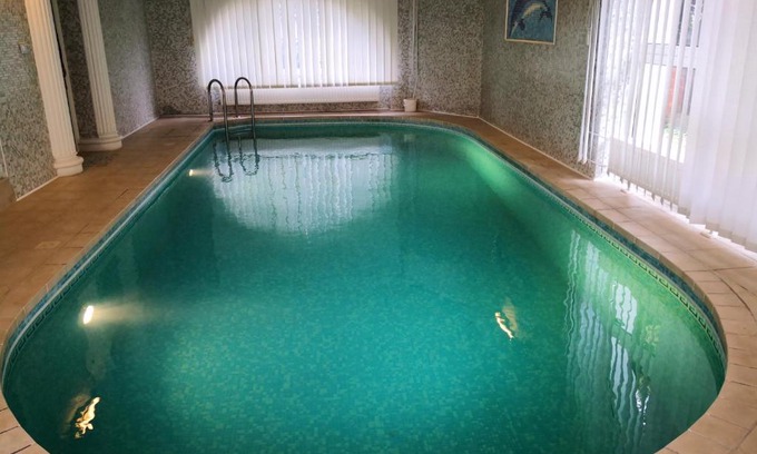 Szeged Apartment | Discover Kupola Apartman: Family-Friendly with Private Pool
