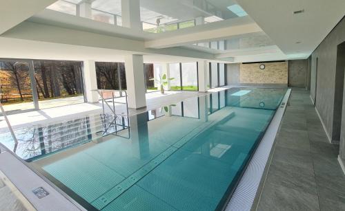 Schluchsee Apartment | Discover Kurhotel Schluchsee App 1321 with Indoor Pool