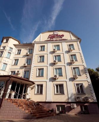 Uralsk Hotel | Family-Friendly Stay at Kurmet Hotel with Pool Amenities