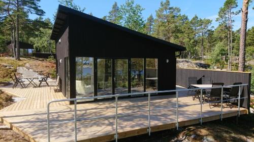 Grisslehamn Cabin | Oceanfront Kvarnsands Strandstugor: Guest Rated 9.5/10