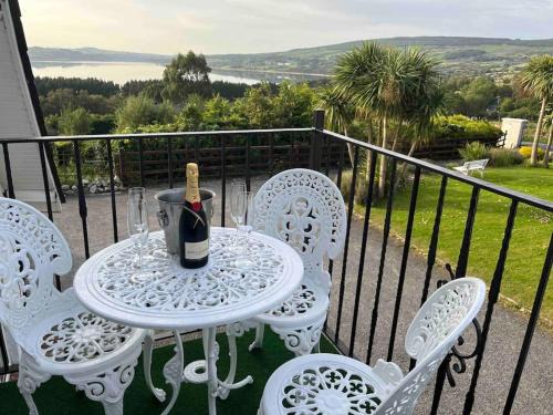 Knockaderry Cross Roads Apartment | Idyllic Kylemore Lakeview Retreat with Oceanfront Views
