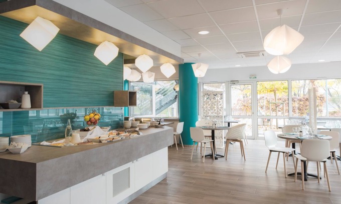 Plaine Centre Ville Hotel | Discover Comfort at Kyriad Lyon Sud - Givors with Spa Access