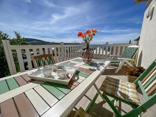 Molini House | Discover Léna - Coastal Terrace Retreat with Family Amenities