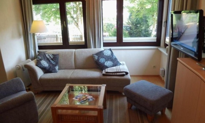 Busumer Deichhausen House | Discover Lütt Hus: Pet-Friendly Oceanfront Getaway