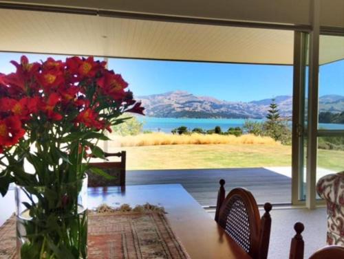 Akaroa Bed & Breakfast | Experience L'abri Bed and Breakfast with Oceanfront Views