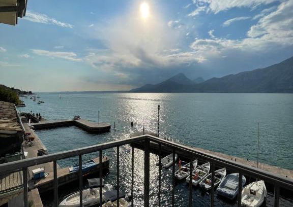 Brenzone sul Garda Apartment | Oceanfront Retreat at l'angolo sul porto - 4-Star Stay