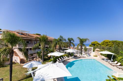 Ricadi Apartment | Discover L' Arcobaleno Resort: Oceanfront Retreat with Pool