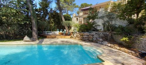 Saint-Etienne-du-Gres Villa | Discover L'Arinelle en Provence with a Pool & Child-Friendly Fun