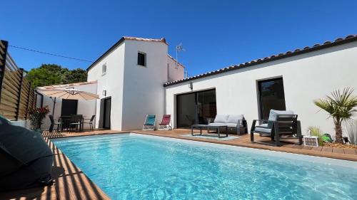 Saint-Jean-de-Monts Villa | Experience L'Ayucca: Oceanfront Stay with Pool & Top Reviews