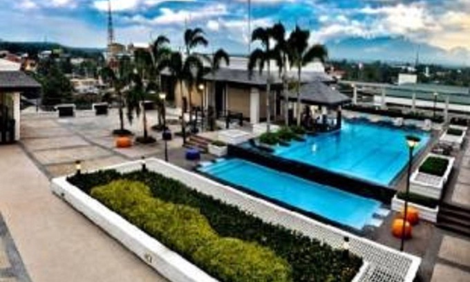 Bacolod Hotel | Discover L'Fisher Chalet: Pool, Spa & Family-Friendly Fun