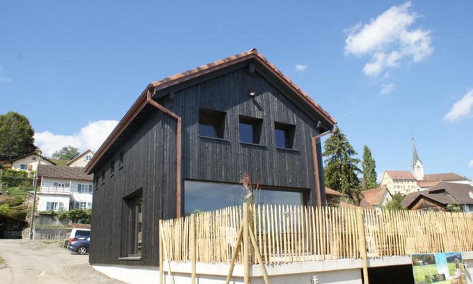 Courtedoux Bed & Breakfast | Discover Comfort at L'hôtât di loup - 4-Star Retreat
