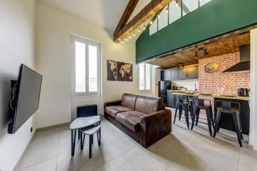 Pierre-Benite Apartment | Stylish L'Industrie Loft with Parking and Top Rating