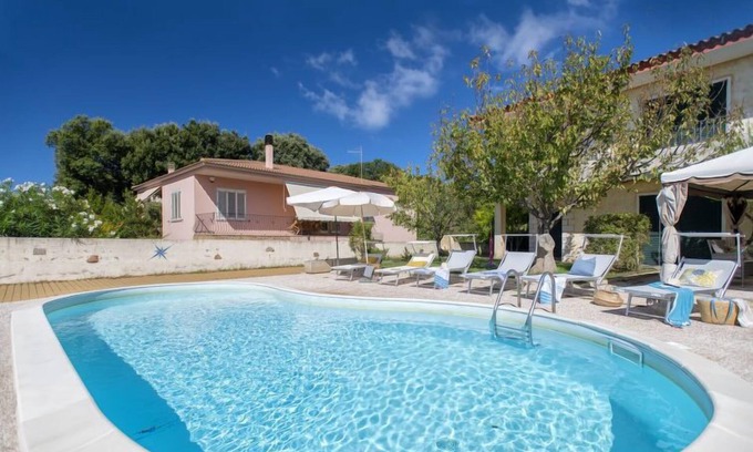 Trinita d'Agultu Apartment | Guest Favorite: L'Oasi Bilo A1 with Pool & Ocean Views