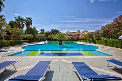 Porto Ottiolu Apartment | Oceanfront Porto Ottiolu Residence: Pet-Friendly Retreat