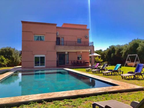 Oulad Snaguia Villa | Discover L'Oasis Villa: 4-Star Oceanfront Retreat