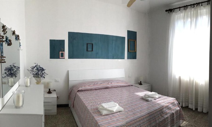Rezza Apartment | Discover Family-Friendly Comfort at L'orto al mare