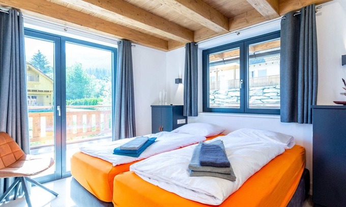 Sankt Margarethen im Lungau Ski Chalet | Indulgent Chalet with Two Saunas and Hot Tubs Await