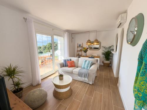 Son Parc Apartment | Atardecer Menorca: Oceanfront Haven with Pool Access