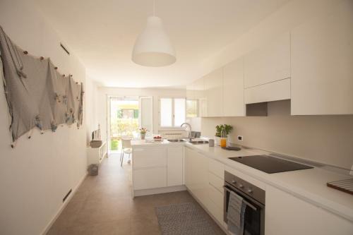 Caorle Apartment | Experience La Casa di Giò: Oceanfront Bliss Awaits!