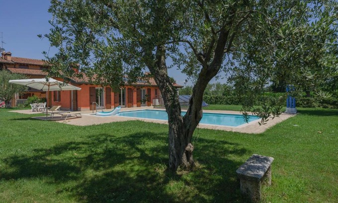 Pozzolengo Apartment | La Casina Apartment: Garden Oasis with Pool & Ocean Views
