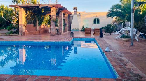 Alcala de Guadaira Apartment | Relax at La Casita del Cactus - Pool & Oceanfront Retreat
