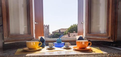 Desenzano del Garda Apartment | Indulge in La Chicca sui Tetti: 4-Star Family Retreat