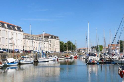 Rochefort Apartment | La Fayette 2*: Comfortable Stay with Port Views & Family-Friendly