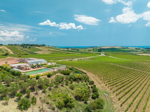 Menfi Resort | Experience La Foresteria Planetaestate with Oceanfront Views