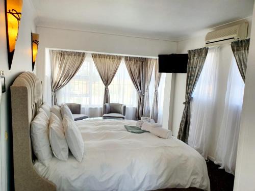 Bluewater Bay House | Experience Oceanfront Comfort at La Grace Executive Guesthouse