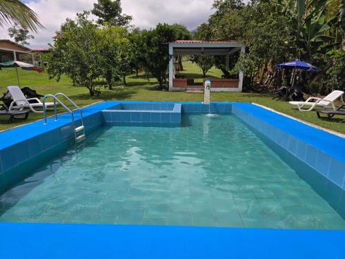 Yotoco House | Relax at La Hogareña: Oceanfront Bliss with Pool Access