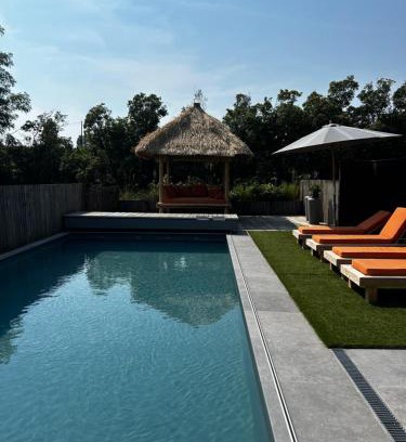 Tournai House | Discover La Jauchelle: Oceanfront Retreat with Pool Access