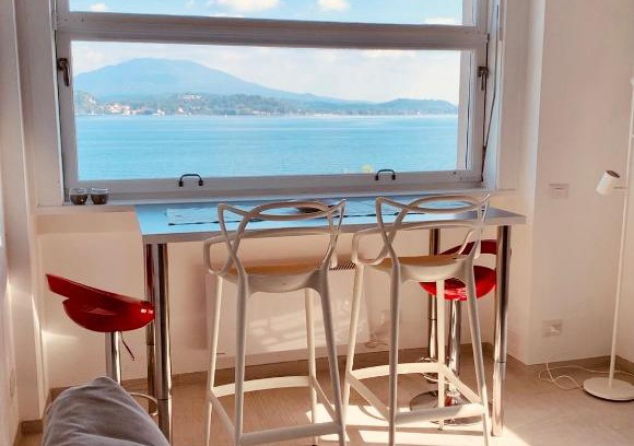 Belgirate Apartment | Scenic Lakefront Retreat with Ocean View & Private Beach