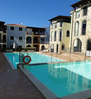 La Muddizza Apartment | Relax at La Muddizza: Oceanfront Apartment with Pool
