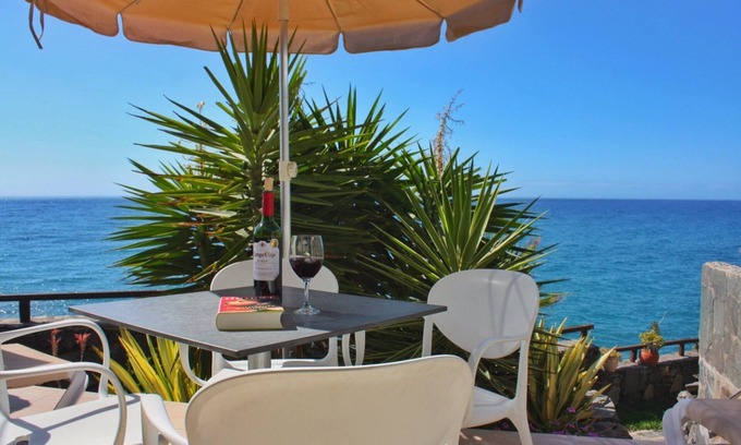 Playa del Aguila House | Beachfront Bungalows at La Perla with Ocean Views & Pool