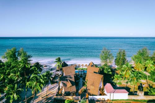Pwani Mchangani Resort | Serene La Perla Beach Resort - Your Oceanfront Retreat