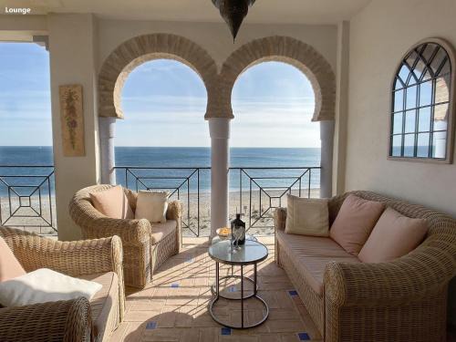 Bahia de Casares Apartment | Beautiful LA PERLA DE LA BAHIA: Oceanfront Oasis Awaits
