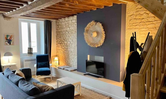 Luc-sur-Mer Apartment | Oceanfront Retreat: La Petite Baleine Steps from the Beach