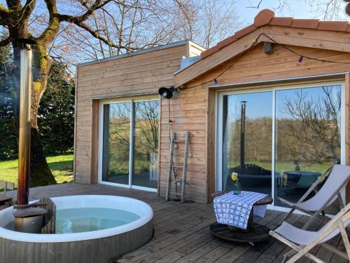 Maureville House | Romantic Escape at La Petite Cabane: Pool & Hot Tub Retreat