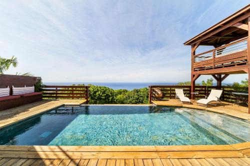 Saint-Joseph Bed & Breakfast | Experience La Plantation: Oceanfront Bliss with Spa & Pool