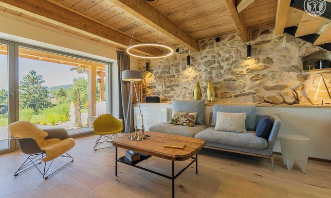 Les Deserts House | Discover LA Prairie: Lake View, Spa & Family-Friendly Stay