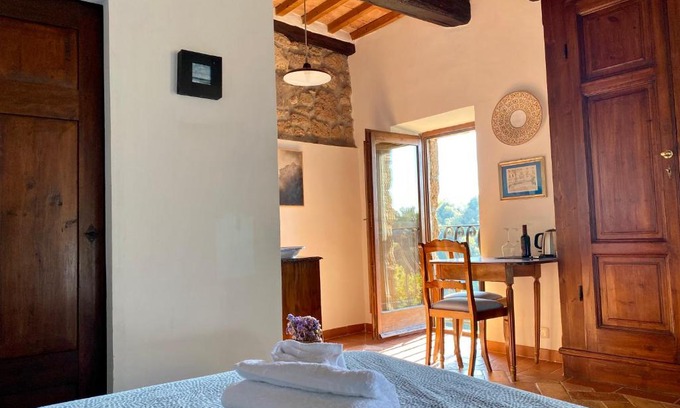 Pitigliano Apartment | Oceanfront La Sorpresa Monolocale with Scenic Valley Views