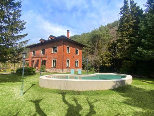 Guardiola de Bergueda Ski Chalet | Oceanfront Retreat at La Torre de Guardiola - 10/10 Rated