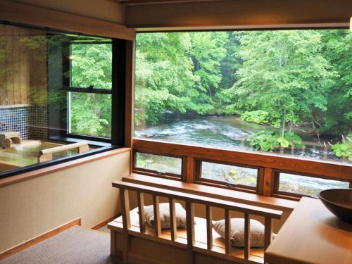 Akanko Onsen Hotel | Discover La Vista Akangawa: Family-Friendly with Hot Tub