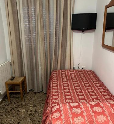 La Calahorra House | Explore LABELLA Hostal Restaurante: Pet-Friendly Retreat