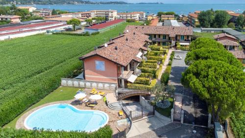 Pieve Vecchia House | Tranquil Lago di Garda Retreat: Steps from Manerba Shores