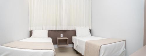 Jardim Paraiso Hotel | Experience Lagoa Eco Towers: Oceanfront Retreat with Pools