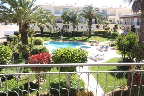 Porto de Mos Apartment | Beachfront Lagos Condo with Pool and Ocean Views
