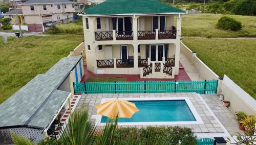 Bayfield Villa | Serene Lailamar Villa: Ocean View with Pool Access