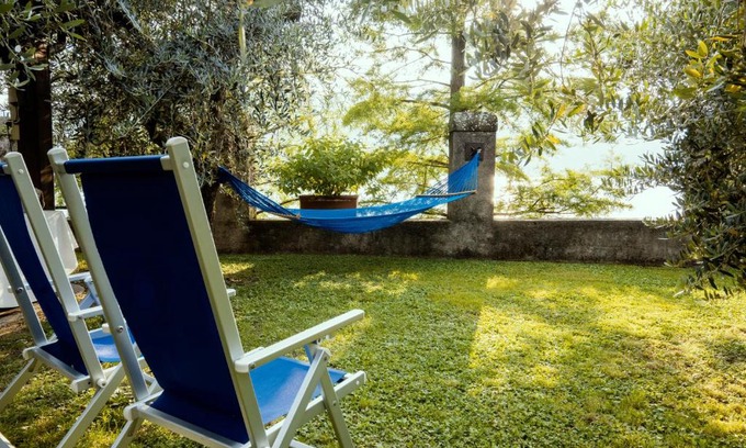 Marone Apartment | Unforgettable Lake Experience with Private Beach Access