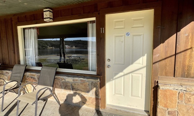 Graham Cabin | Pet-Friendly Lakefront Cabin #11 with Scenic Porch Views